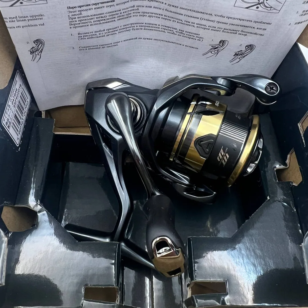 Kołowrotek spinningowy Shimano Ultegra C2000S czarno-złoty — zdjęcie 1