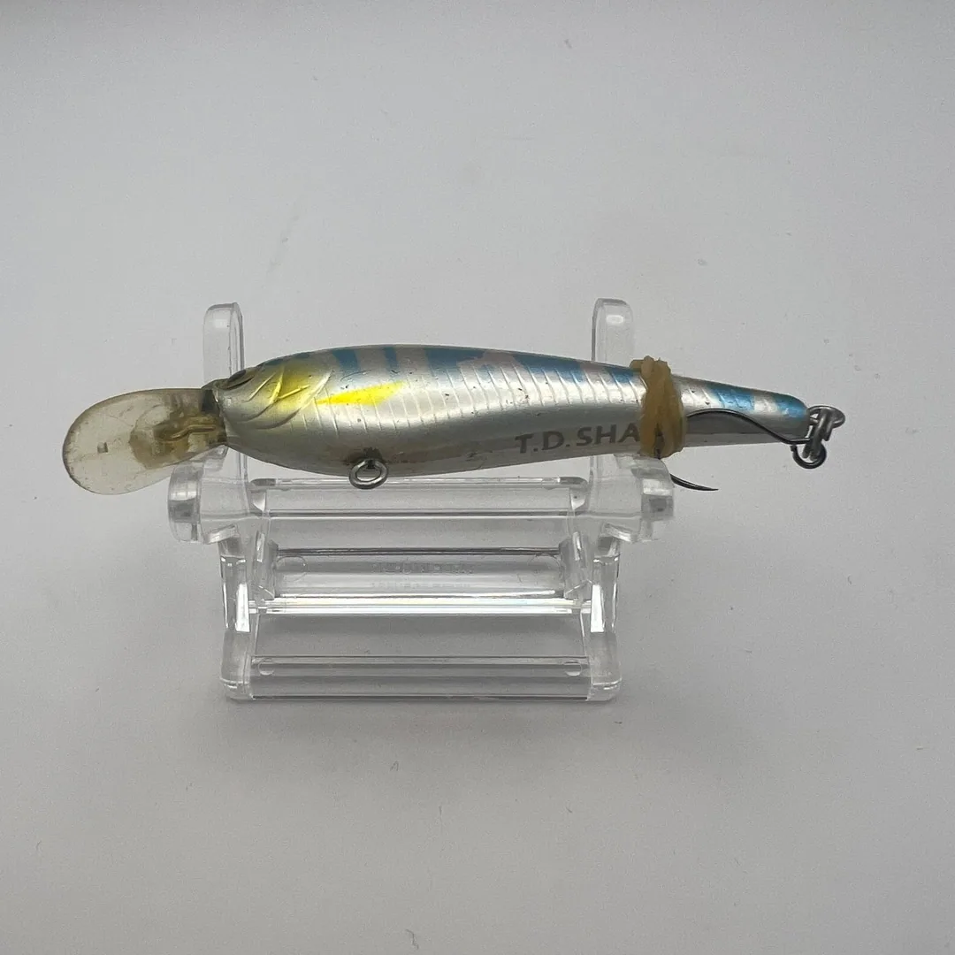 Wobler Daiwa TD Shad 60mm, złoty kolor — zdjęcie 3