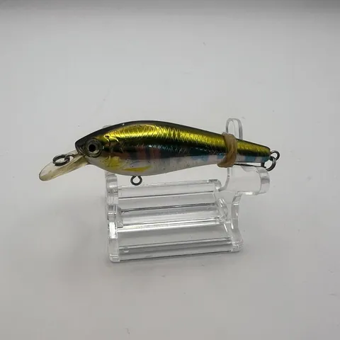 Wobler Daiwa TD Shad 60mm, złoty kolor