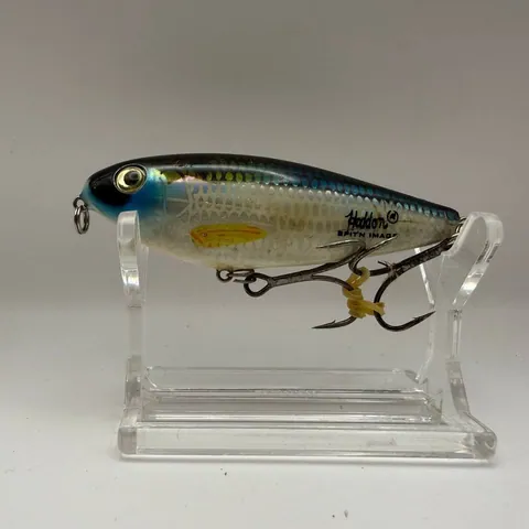 Popper Heddon Spit'n Image, niebieski, żółte akcenty